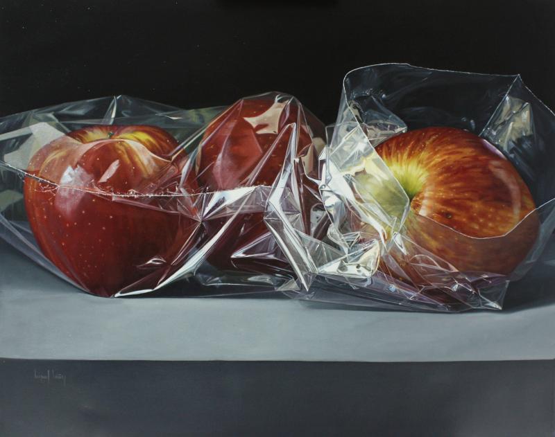 Bolsa con tres manzanas